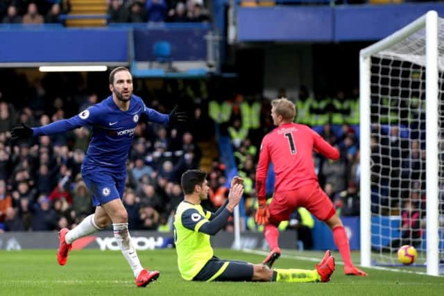 THAT'S JUST FOR STARTERS: Chelsea's Gonzalo Higuain (left) celebrates scoring his side's first goal against Huddersfield at Stamford Bridge. Picture: John Walton/PA