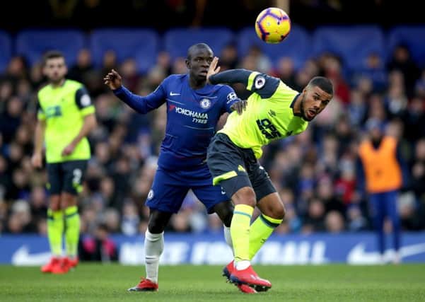 Central character: Huddersfield Town's Elias Kachunga battles with Chelsea's N'Golo Kante.