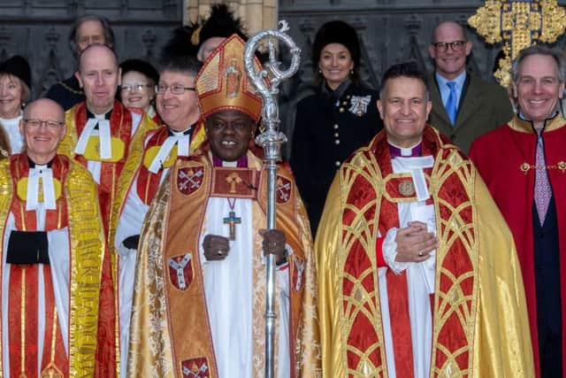 Archbishop of York, John Sentamu, next to The Dean of York The Right Reverend Dr Jonathan Frost, on the steps of York Minster after the service.