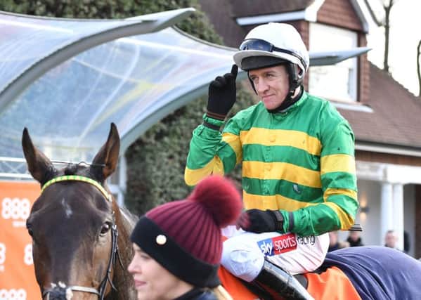 Buveur D'Air, Barry Geraghty and stable lass Hannah Ryan after the horse's win at Sandown.