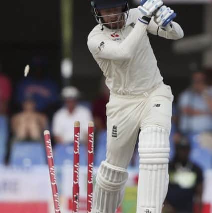 England's Jonny Bairstow is bowled by West Indies' captain Jason Holder in Antigua. Picture: AP/Ricardo Mazalan