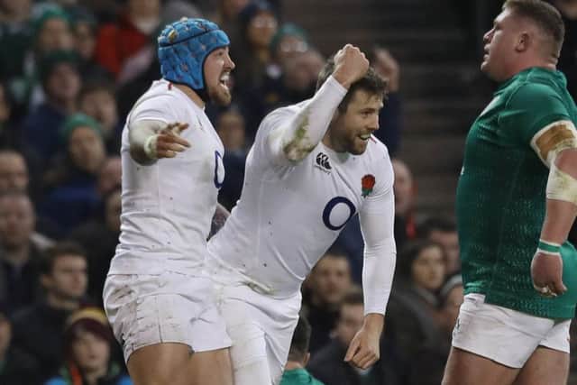 England's Elliot Daly celebrates after scoring a try in the 32-20 success.