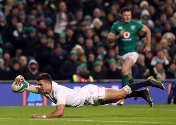 England's Henry Slade scores his side's fourth try and his second of the match during the win over Ireland.