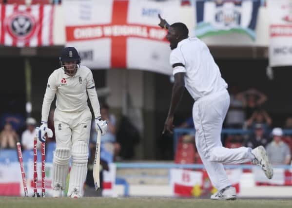 West Indies' captain Jason Holder celebrates after he bowled Yorkshire and England's Jonny Bairstow during the hosts' 10-wicket win.