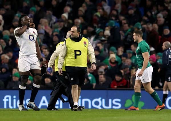 England's Maro Itoje leaves the pitch with an injury during the Six Nations win over Ireland at the Aviva Stadium, Dublin (Picture: Brian Lawless/PA Wire).