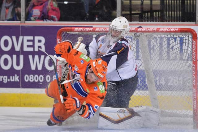 Sheffield Steelers' John Armstrong takes a tumble during the 3-2 win over Guildford. Picture: Dean Woolley.