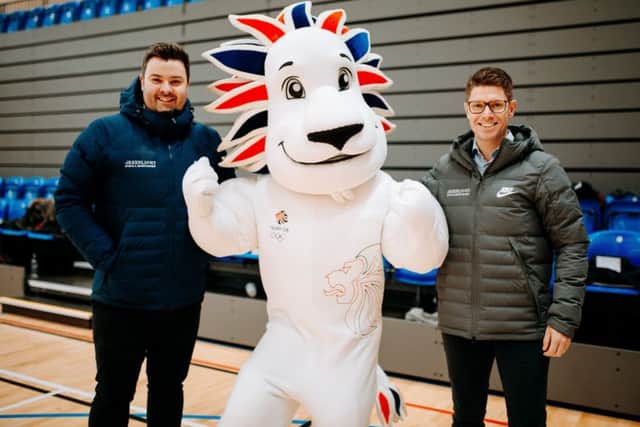 Sporting chance: Ben Milhench, left, with Guy Smith, right, of Greenlight, and the Team GB mascot.