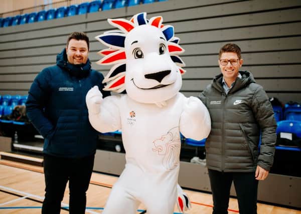 Sporting chance: Ben Milhench, left, with Guy Smith, right, of Greenlight, and the Team GB mascot.