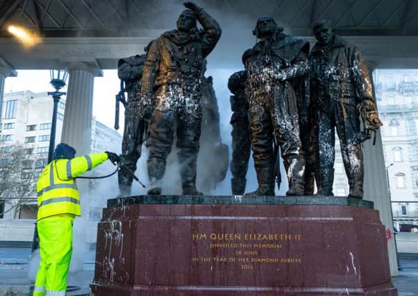 Specialist clean-up workers use high pressure steam to clean the paint vandals squirted over the Bomber Command Memorial in Green Park in the early hours of Monday 21 January. The operation is expected to take at least a day. London, January 22 2019.See National News story NNpaint.Cleaners have begun power-washing the war memorials and statues that were covered in paint by vandals.Three war memorials and a statue in West London were splattered and smeared with white paint over the weekend in what some believe to be a co-ordinated â¬Üpeaceâ¬" protest.The worst effected was the Royal Air Force bombers command memorial in Green Park.