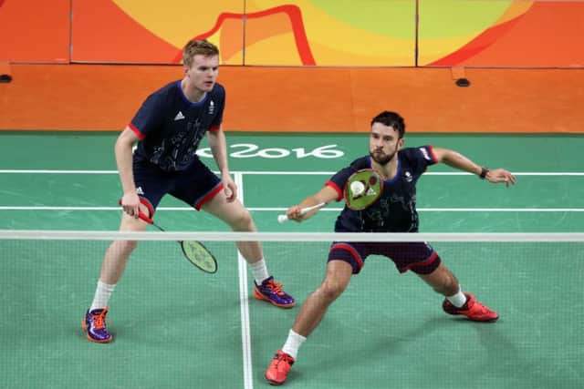 CLOSE-FOUGHT: Marcus Ellis and Chris Langridge (right) in action against China's Chai Biao and Hong Wei during the Olympics men's doubles bronze medal match in Rio. Picture: Owen Humphreys/PA