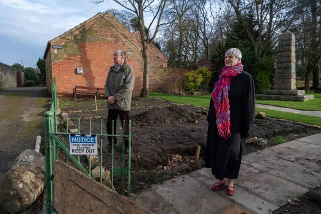 John Robinson, with Angela Taylor, Chairman of Great Ayton Parish Council, at the site of Captain Cook's parents' home.