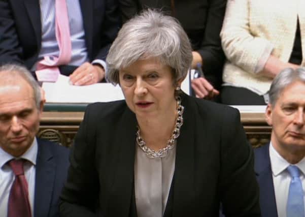 Theresa May faces multiple challenges in the coming days. Pic: Press Association