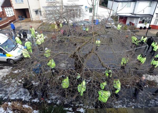 Police at one of Sheffield's tree felling sites in 2018.