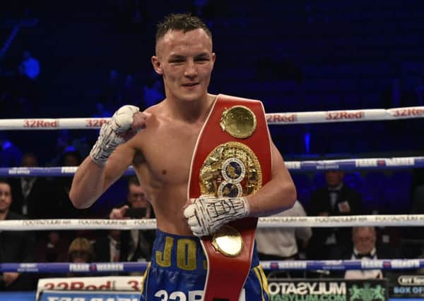 Josh Warrington after retaining his belt against Carl Frampton at the Manchester Arena in December.
