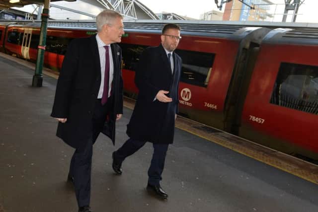 Rail Minister Andrew Jones with Richard Allan, Northern's deputy director.