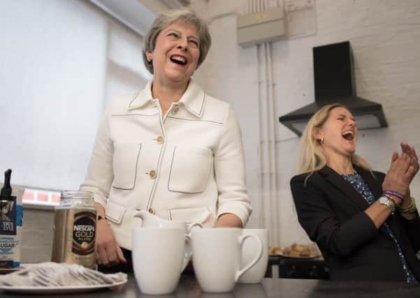 Theresa May gave her backing to the loneliness campaign at an event staged with Lim Leadbeater, the sister of murdered MP Jo Cox.
