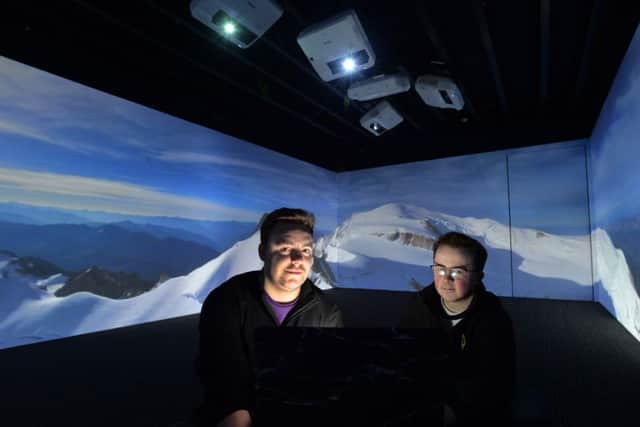 Andy Delmaine and Charlie Cooper in one of their immersive interactive classrooms.