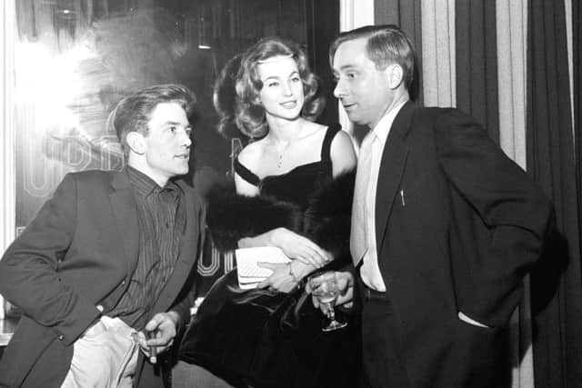 Albert Finney (left) with co-star Shirley Anne Field and author Alan Sillitoe attending a pre-premier party of 'Saturday Night and Sunday Morning'.