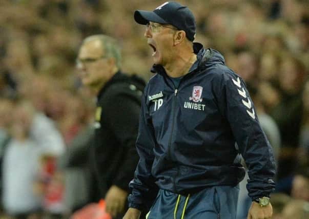 WE MEET AGAIN: Middlesbrough manager Tony Pulis pictured with Leeds' Marcelo Bielsa in the background.