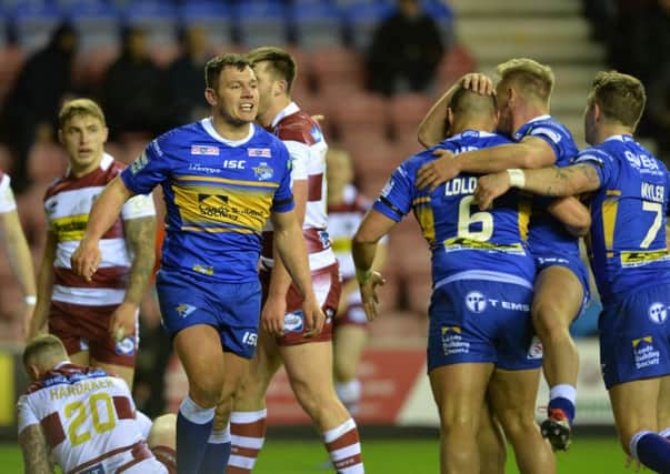 Brett Ferres celebrates scoring the Rhinos second try at Wigan (Picture: Bruce Rollinson)