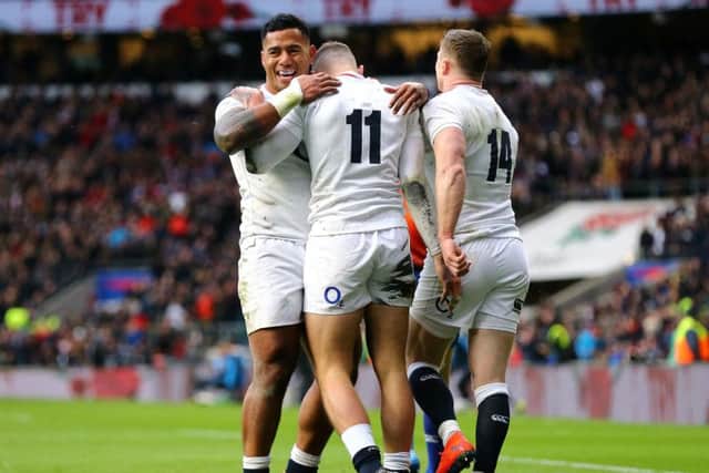 Jonny May (centre) celebrates his hat-trick try against France. (PIC: Gareth Fuller/PA Wire)