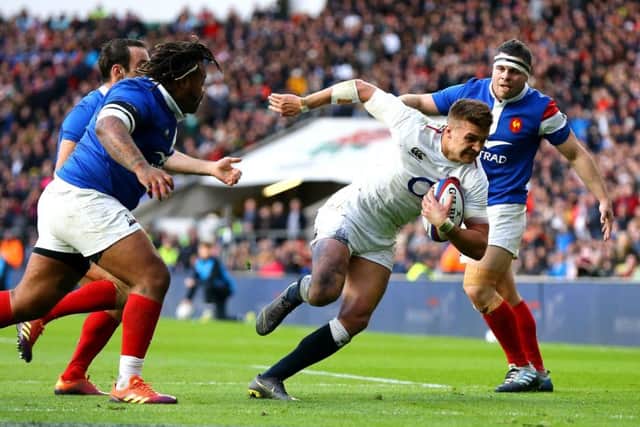 England's Henry Slade (centre) scores his side's fourth try at Twickenham. Picture: Gareth Fuller/PA