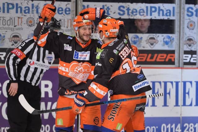 OPENING SALVO: Captain Jonathan Phillips celebrates Sheffield Steelers' first goal against Nottingham. Picture: Dean Woolley.