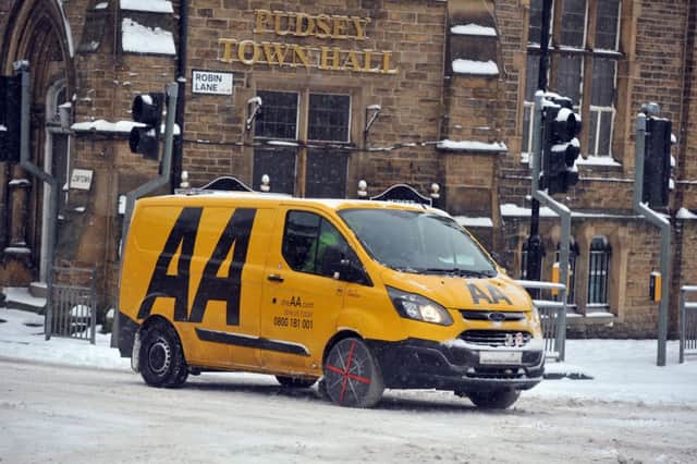 The AA on patrol in Pudsey, near Leeds, in bad weather. Picture Tony Johnson.