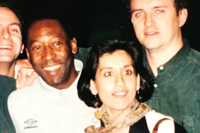 Armstrong with Pele in the 1990s.