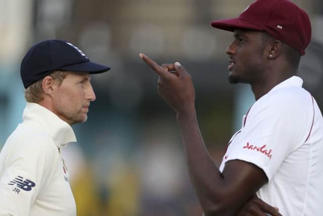 England's captain Joe Root in conversation with West Indies' counterpart Jason Holder at the conclusion of the three-Test series (Picture: Ricardo Mazalan/AP).
