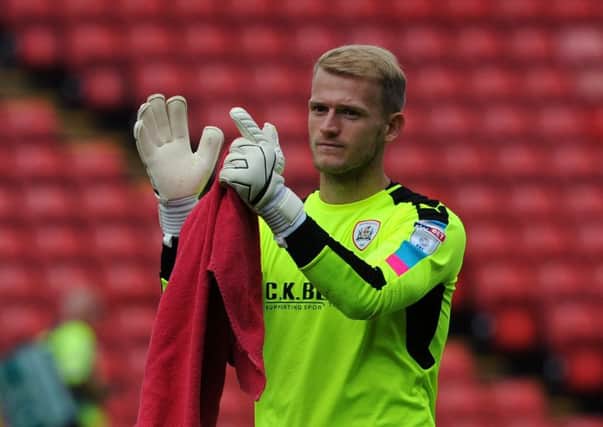 Barnsley goalkeeper Adam Davies hopes to captain the side to promotion back to the Championship from League One (Picture: Jonathan Gawthorpe).