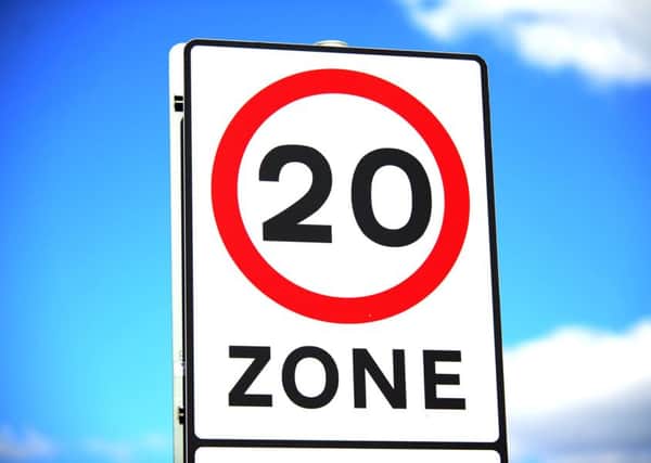 Do 20mph zones improve road safety sufficiently to justify their cost?