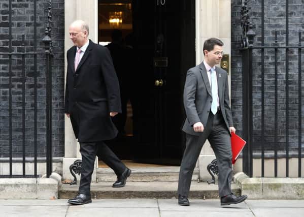Transport Secretary Chris Grayling and Communities Secretary James Brokenshire leave last week's Cabinet shortly before the latter rebuffed the One Yorkshire devolution deal.