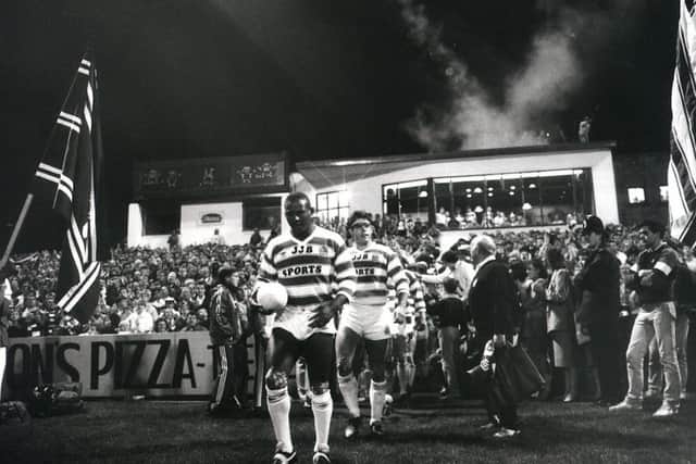Ellery Hanley leads out Wiganto face Manly in the World Club Challenge game in 1987. The fireworks display would not be the only sparks to fly that evening. (Picture: Wigan archive)