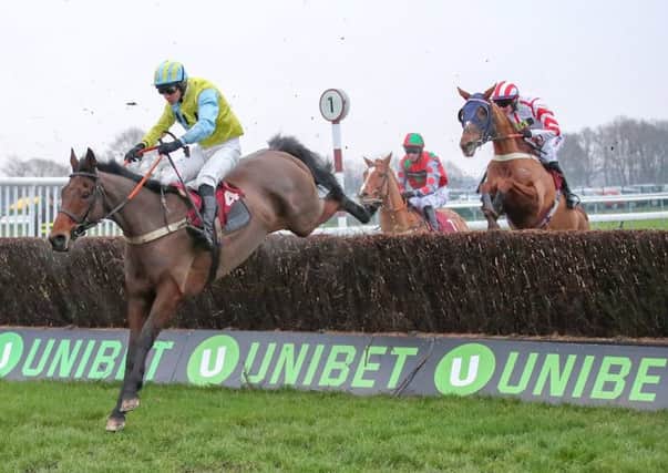 Wakanda and Damnny Cook (left) return to Haydock where they won the Peter Marsh Chase last month.