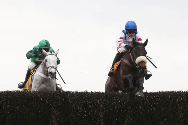 Clan Des Obeaux and Harry Cobden (right) completed their Gold Cup preparations by winning the Denman Chase in the colours of Sir Alex Ferguson.