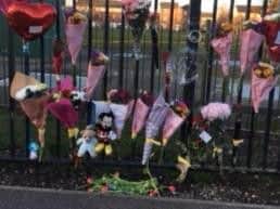Tributes have been left at the scene throughout the day.