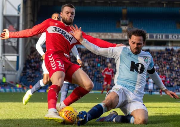 Middlesbrough Jonny Howson (left) is tackled by Blackburn Rovers Bradley Dack during the Sky Bet Championship match at Ewood Park. (Picture: Ian Hodgson/PA Wire)