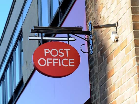The men tried to exchange the foreign currency at a Post Office branch in Beverley.