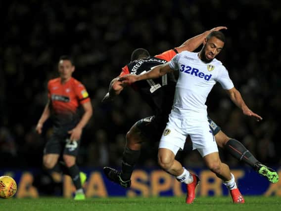 INJURED: Leeds United striker Kemar Roofe during last Wednesday night's 2-1 win against Swansea City, the game in which the striker suffered damaged knee ligaments.