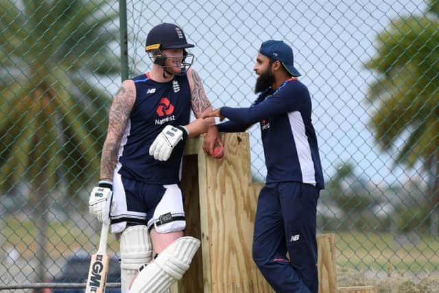 IN A SPIN: Adil Rashid talks with Ben Stokes during a recent net practice session. Picture: Shaun Botterill/Getty Images