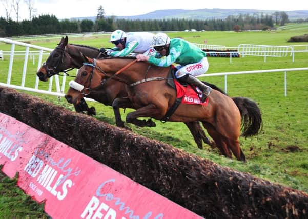 Presenting Percy, nearest camera, seen taking on Our Duke at Gowran Park (Picture: PA Wire).