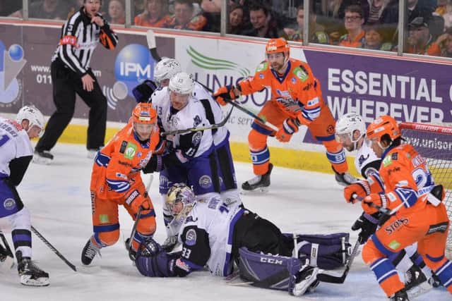 ONE TO FORGET: Sheffield Steelers' scramble to try and get the puck in the Glasgow Clan net during Wednesday night's 6-1 loss. Picture: Dean Woolley.