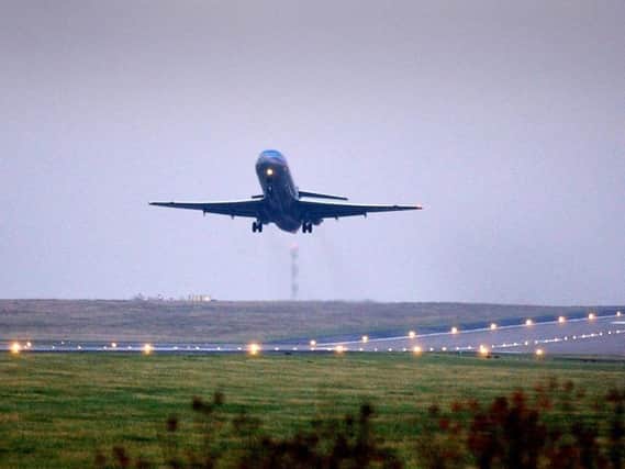 A British Midland flight to London Heathrow leaves Leeds Bradford Airport in 2003