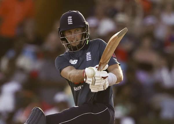 England's Joe Root plays a shot against West Indies during the first One Day International cricket match at the Kensington Oval in Bridgetown, Barbados. (AP Photo/Ricardo Mazalan)