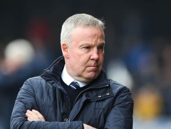 Portsmouth manager Kenny Jackett has defended James Vaughan