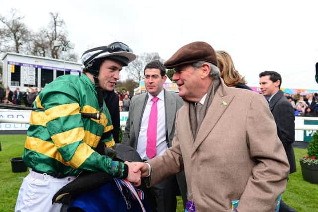 Ben Haslam traions for leading owner JP McManus who is pictured (right) in the winner's enclosure at Leopardstown.