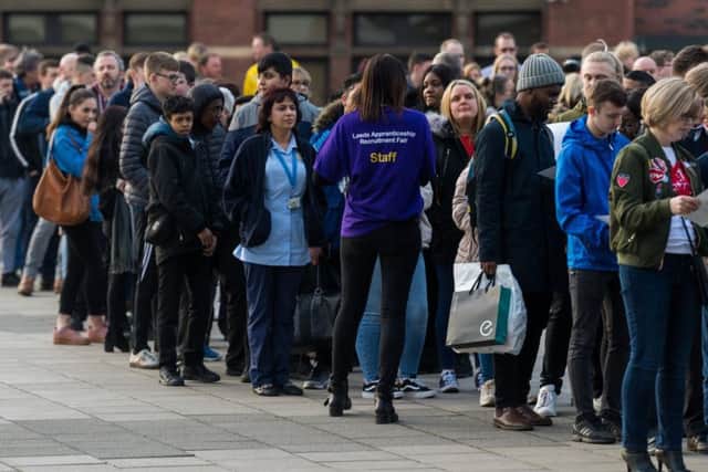 Hundreds queue outside the Leeds Apprenticeships Recruitment Fair in March 2018.