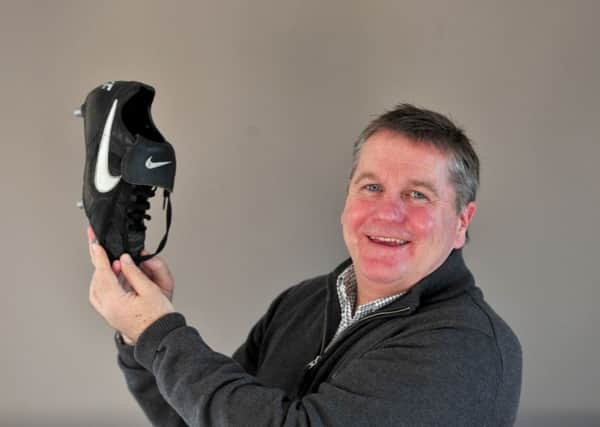 REUNITED: John Hendrie with the football boot that scored the last-ever goal at Ayresome Park for Middlesbrough - it has been returned to him after 24 years.
 Picture: Gerard Binks.