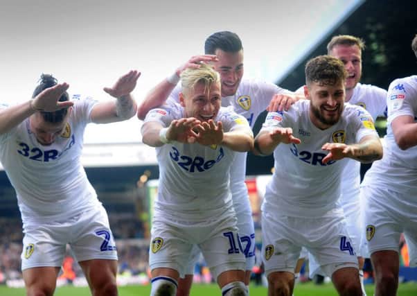 Match-winner: Gjanni Alioski celebrates making it 2-1 to Leeds. Picture: Simon Hulme
